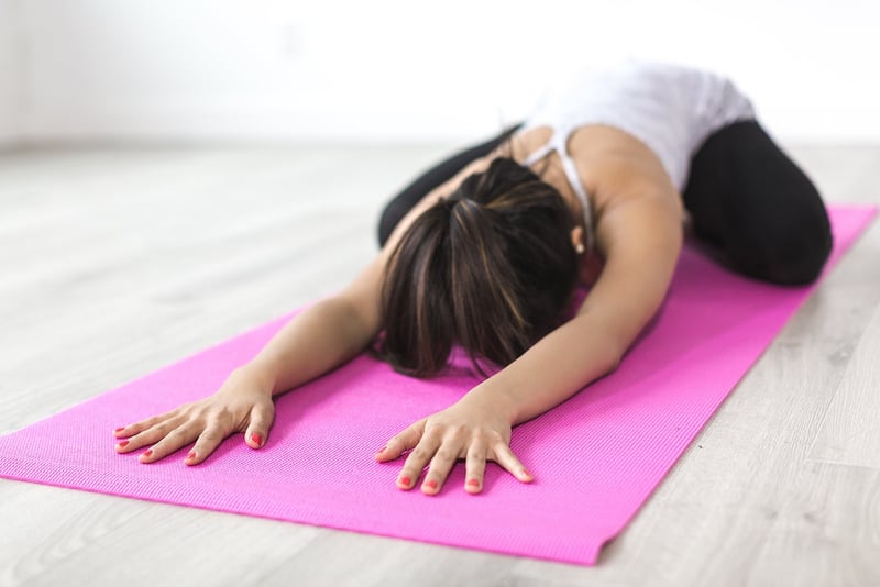 Woman practicing yoga pose